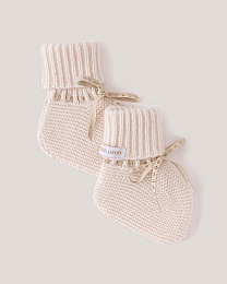 Носки молочного цвета с бежевой лентой от бренда Anna Leon