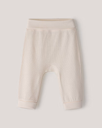 Набор штанов из фактурной ткани горчичного и бежевого цвета от бренда Anna Leon