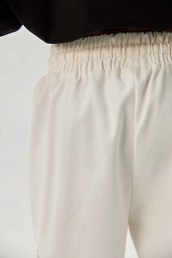 Брюки KARGO коттон молочного цвета от бренда Liqlo