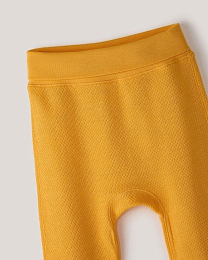 Набор штанов из фактурной ткани горчичного и бежевого цвета от бренда Anna Leon