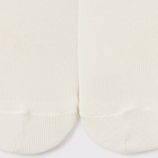 Колготки молочного цвета с бантом от бренда Mayoral