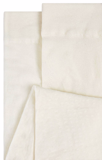 Колготки молочного цвета в крапинку от бренда Abel and Lula