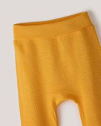 Набор штанов из фактурной ткани горчичного и бежевого цвета от бренда Anna Leon
