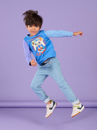 Джинсы светло-голубые на завязках от бренда DPAM