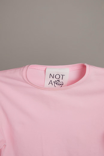 Лонгслив розового цвета от бренда NOT A TOY