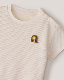 Комплект футболка и брюки в молочном цвете от бренда Anna Leon