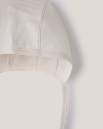 Набор чепчиков зеленого и белого цвета от бренда Anna Leon