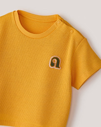 Комплект футболка и брюки в горчичном цвете от бренда Anna Leon