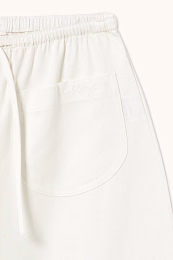 Штаны с подворотом белого цвета от бренда Tinycottons
