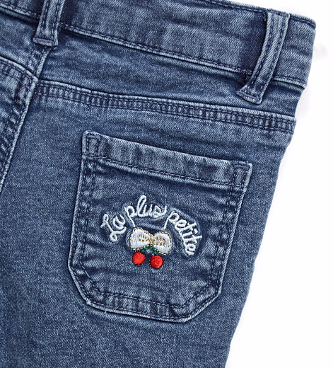 Джинсы-клеш с бахромой от бренда Original Marines