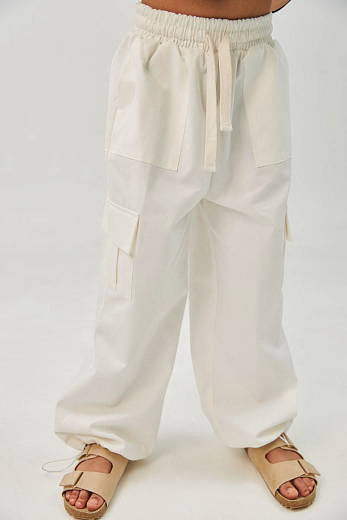 Брюки KARGO коттон молочного цвета от бренда Liqlo