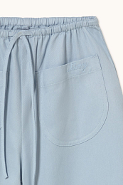 Штаны с подворотом голубого цвета от бренда Tinycottons