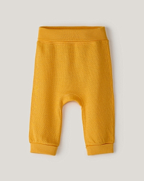 Набор штанов из фактурной ткани горчичного и бежевого цвета от бренда Anna Leon