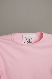 Лонгслив розового цвета от бренда NOT A TOY