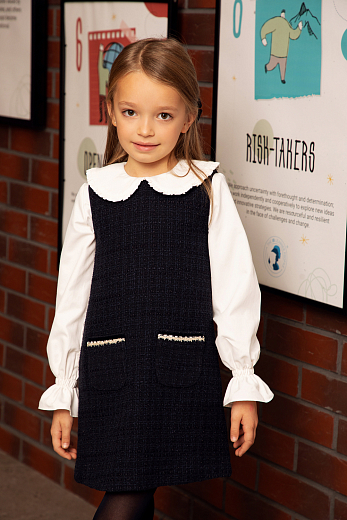 Блузка молочного цвета с манжетой на резинке от бренда Eirene