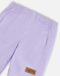 Куртка с принтом цветов и штаны от бренда Deux par deux