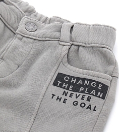 Спортивные штаны с надписью на кармане от бренда Original Marines