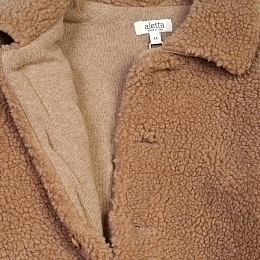 Укороченное меховое пальто от бренда Aletta