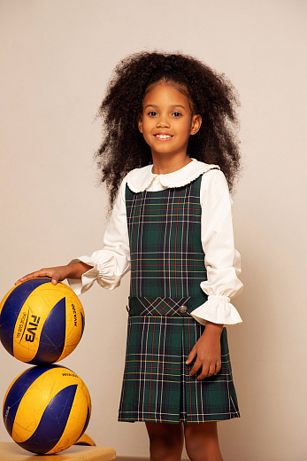 Блузка молочного цвета с манжетой на резинке от бренда Eirene