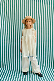 Брюки клеш с подворотом от бренда Tinycottons