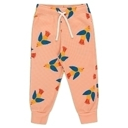 Джоггеры оранжевого цвета с птичками от бренда Tinycottons