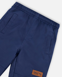 Куртка разноцветная, флисовая кофта и штаны от бренда Deux par deux