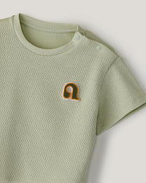 Комплект футболка, брюки в нежно-зеленом цвете от бренда Anna Leon