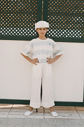 Брюки клеш с подворотом от бренда Tinycottons