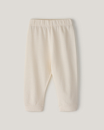 Комплект футболка и ползунки в молочном цвете от бренда Anna Leon