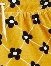 Шорты желтые с принтом цветов от бренда Mini Rodini