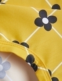 Плавки желтые с принтом цветов от бренда Mini Rodini