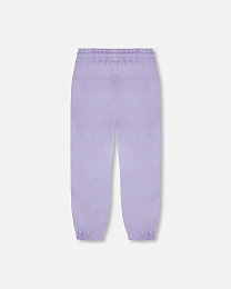 Куртка с принтом цветов и штаны от бренда Deux par deux