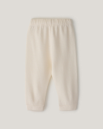 Комплект футболка и ползунки в молочном цвете от бренда Anna Leon