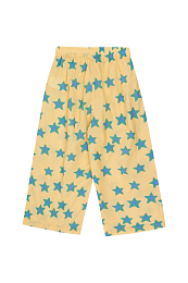 Брюки желтые со звездами от бренда Tinycottons